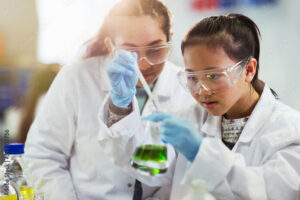 Women in STEM doing experiment